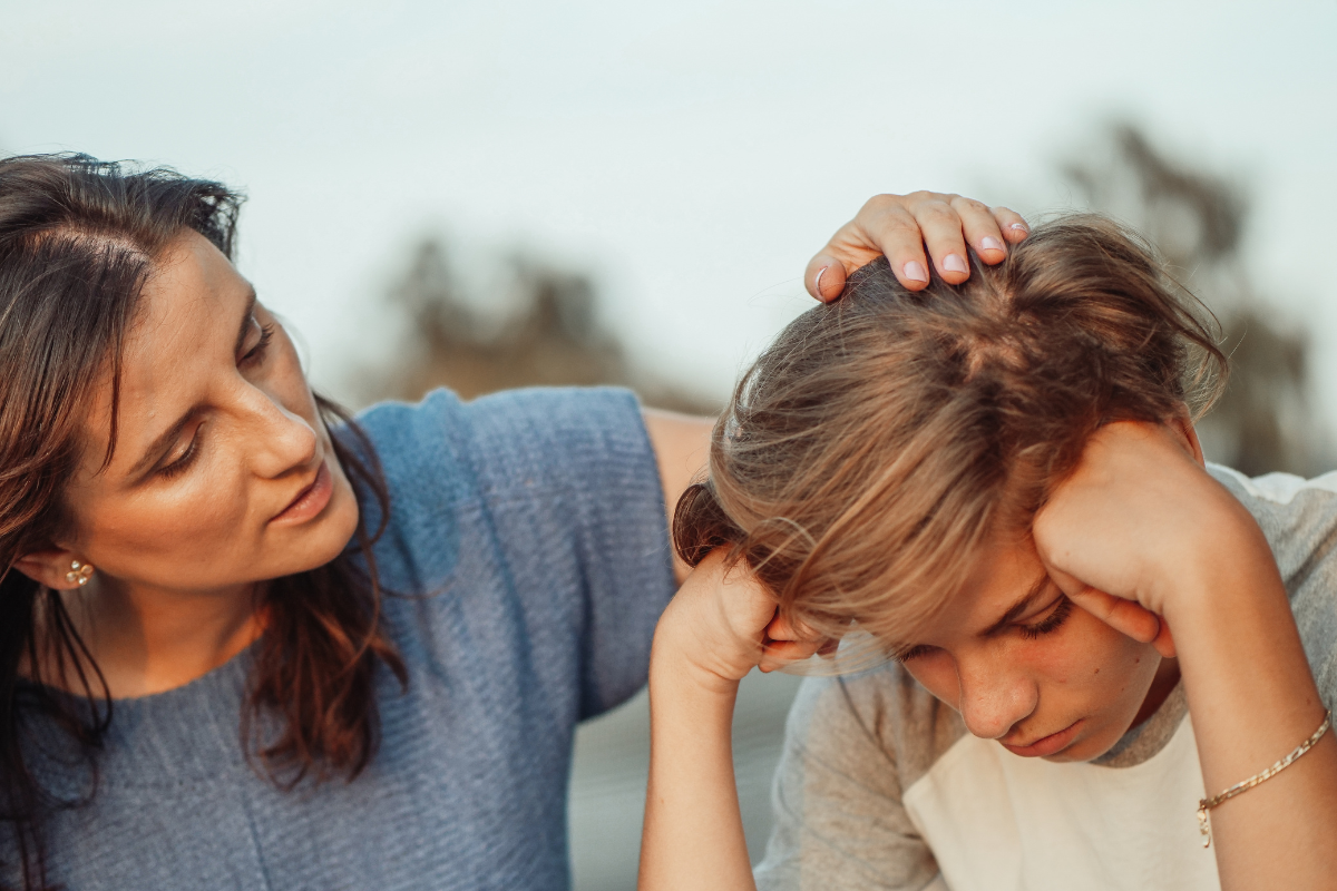 Parent noticing hidden anxiety signs in a child during a calm conversation