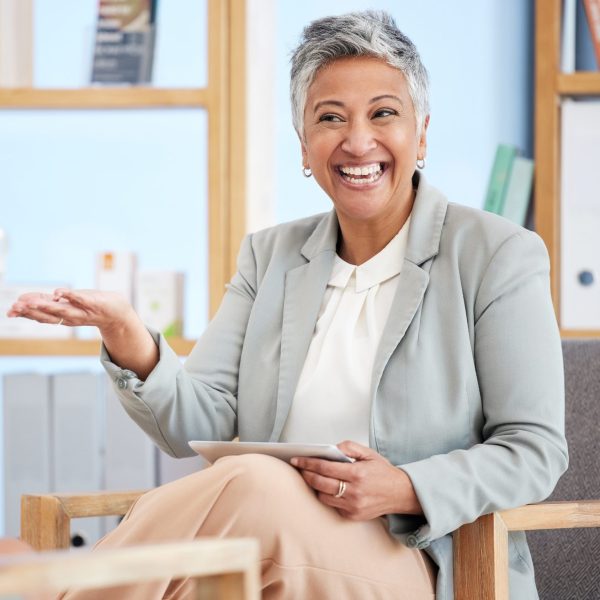 Happy woman, therapist and therapy advice, mental health questions and speaking to client in consul